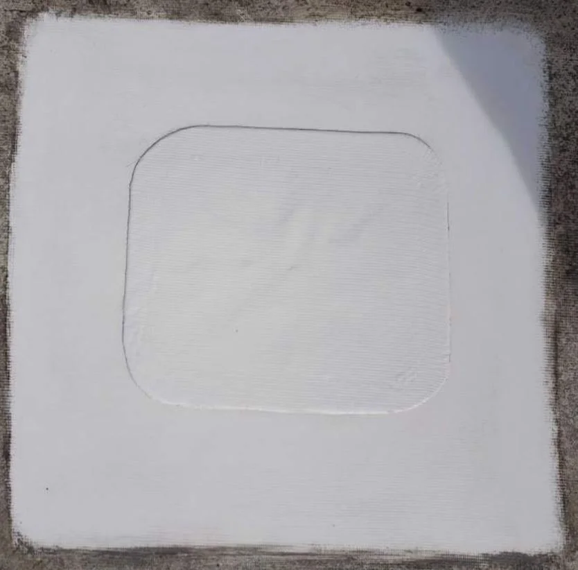 The same spot heat-welded flat under a new membrane patch